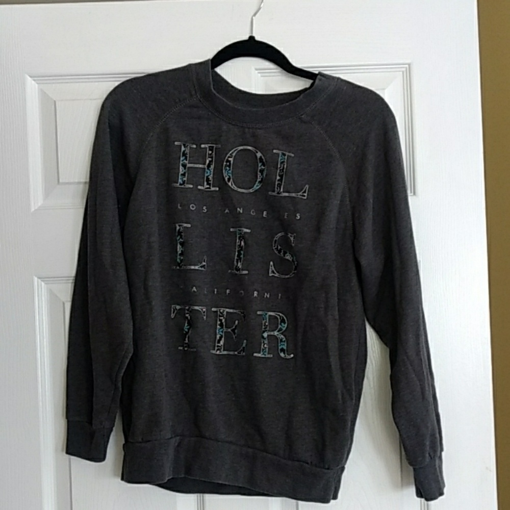 Hollister sweater with flowered lettering